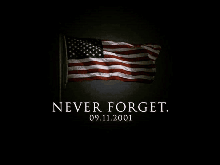 American flag waving aomg a dark black background with the words, "Never Forget September 11, 2001"