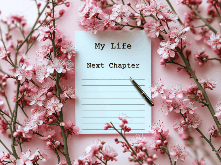 Notebook page titled “My Life Next Chapter” surrounded by pink blossoms, symbolizing a fresh start in midlife.
